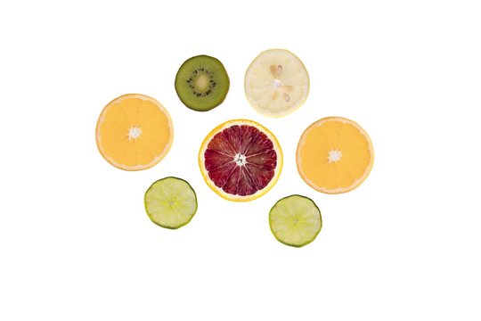 Citrus and kiwi flat lay building over time with progressive timing