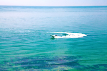 Motor boat on a blue sea