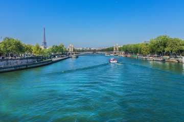 Seine River Embankments and Alexandre III bridge. Paris, France.