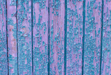 Old wall made from planks with remnants of paint - 134996252
