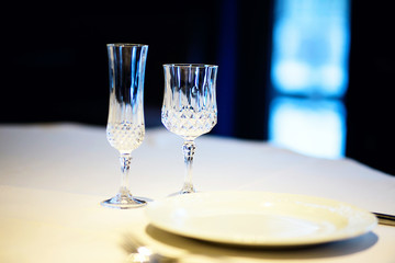 Two empty crystal glasses