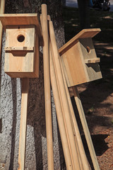 New houses for migratory birds. The birdhouses are manufactured and offered for sale.