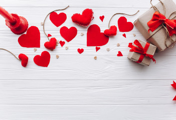 Valentine's Day.  heart felt ,presents,and decor on wooden background