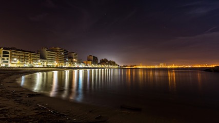 Fototapeta na wymiar Night scene on the Coasta Brava in Spain (town Palamos)
