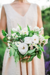 Bouquet in woman hands