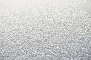 Fototapeta na wymiar Brilliant snow on sunny winter day as natural background