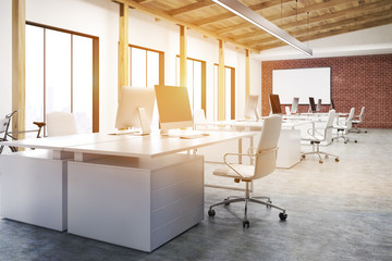 Corner of an office with a whiteboard, toned