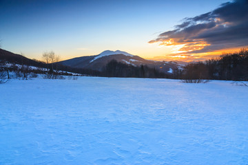 Beautiful winter landscape in the mountains. Sunrise