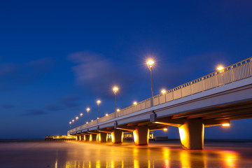 Concrete pier in Kolobrzeg, long exposure shot at sunset