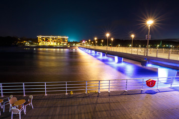 Fototapeta premium Concrete pier in Kolobrzeg, long exposure shot at sunset