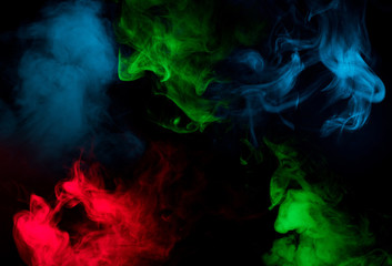 Fototapeta premium colorful smoke on black background