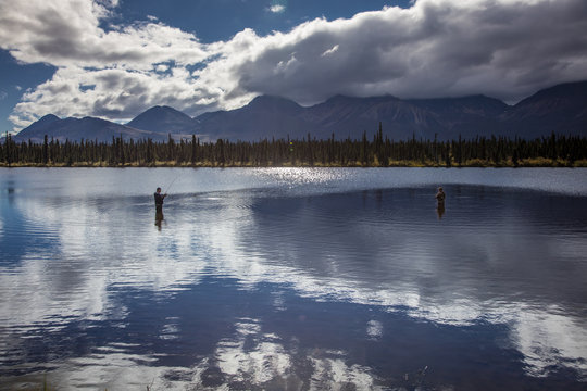 AUGUST 26, 2016 - fishing on lakes of Central Alaskan Range - Route 8, Denali Highway, Alaska,a dirt road offers stunning views of Mnt. Hess Mountain, & Mt. Hayes and Mnt. Debora, Alaska