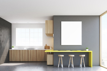 Front view of kitchen countertop and poster