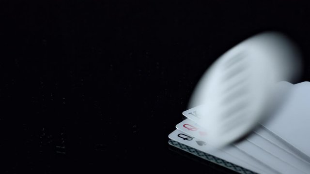 4k Poker Composition of Cards and Dealer Chip Spinning