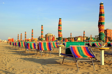 Rimini, Italy. The empty beach with a lot of sunbeds and umbrellas. 