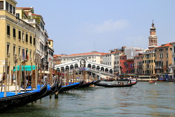 Venice, Italy. The gondolas on the venetian canal near to Ponte di Rialto.