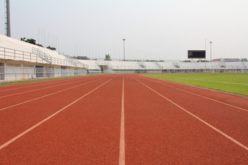 running track and stadium field