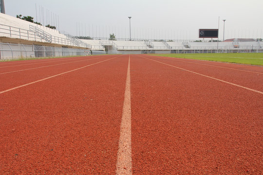 running track and stadium field
