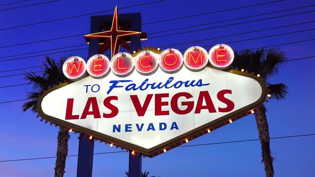 Video of welcome to fabulous Las Vegas Sign at dusk in 4K. High quality video of welcome to fabulous Las Vegas Sign at dusk in 4K