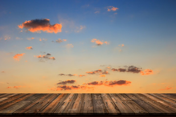 Fototapeta na wymiar Wood floor texture with beautiful sunset clouds.