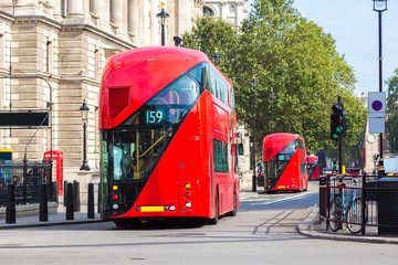 Modern red double decker bus, London