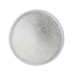 White sugar in white bowl isolated on background
