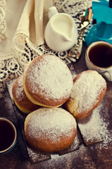 Traditional donuts with powdered sugar