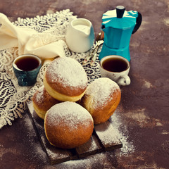 Traditional donuts with powdered sugar