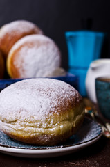 Traditional donuts with powdered sugar