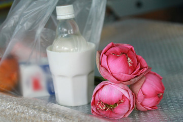 Set morning offerings of  food, money and lotus for monk.