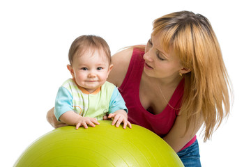 Fototapeta na wymiar beautiful smiling baby on fitball, exercise, massage, healthcare