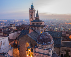 Obraz premium Bergamo - Old city (Citta Alta). One of the beautiful city in Italy. Lombardia. Evening sunset. Landscape on the old city, Cathedral, clock towers and the Po Valley.