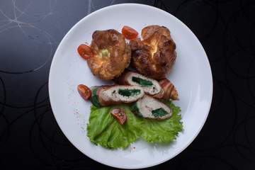 meat rolls on lettuce leaf