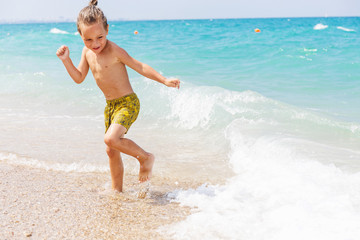 Beautiful boy and the sea
