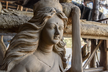 Unfinished clay idol of Hindu Goddess.