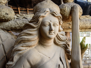 Obraz premium Unfinished clay idol of Hindu Goddess.