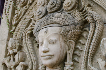 Close Up Ancient Apsara Dancers Stone Carving all around on the wall at Angkor wat one of Seven Wonders SiemReap, Cambodia