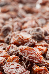 close up black raisins background