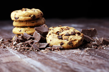 Chocolate cookies on wooden table. Chocolate chip cookies shot