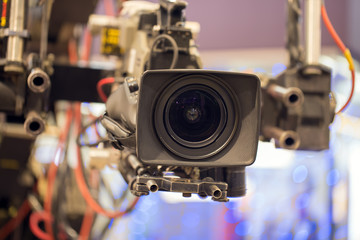 TV professional camera on crane shooting  show in studio decoration.