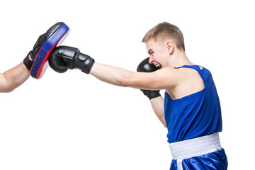 Young boxer working out with coach