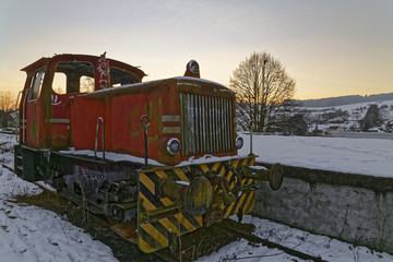 historic locomotive in the sunset
