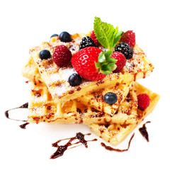 Belgian waffles with ice cream and berry fruits isolated on whi