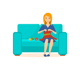Young housewife knits dress on the couch, in quiet home.