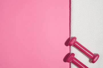 Sport, fitness and healthy lifestyle concept image on bright colorful background. Photograph taken from above, top view.