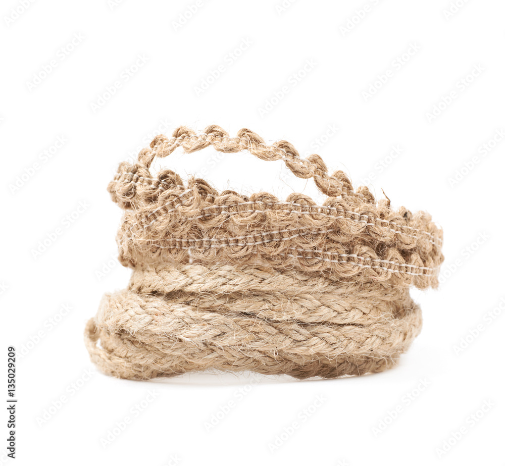 Wall mural pile of a linen rope string isolated
