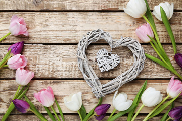 Bouquet of tulips on grey wooden table