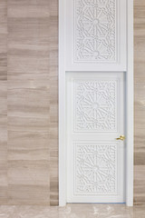 Tall white door
