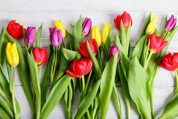 Colored spring flowers tulips background holiday