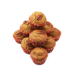 Pile of pecan nut cupcakes isolated